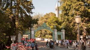 Photo of Sather Gate, with the campanile in the background